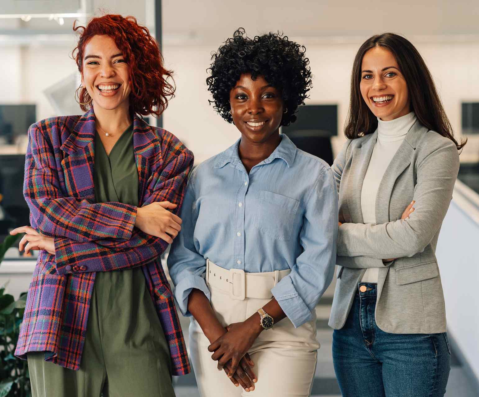 Three Professional Women Standing Together